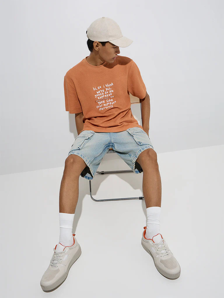 Men’s Orange Relaxed Fit Cotton T-Shirt with Text Print – Trendy Graphic Casual Top for Daily and Weekend Outfits