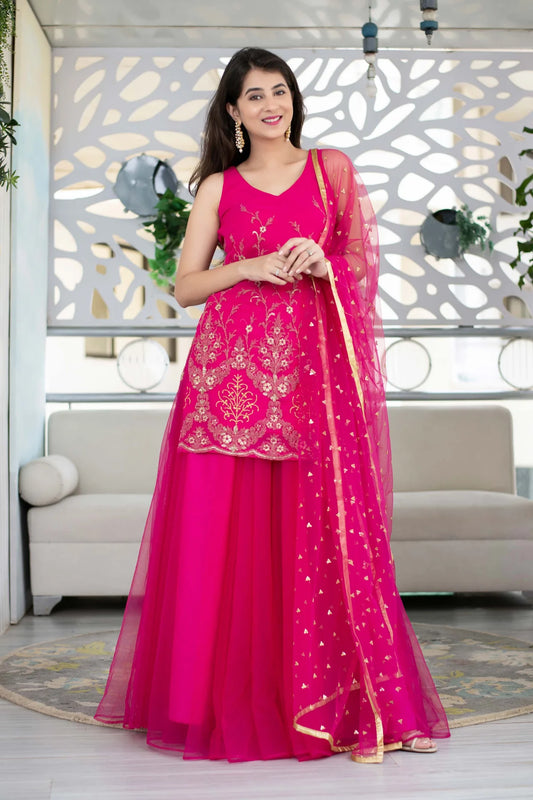 Women Pink Georgette Heavy Work Kurta with Flowing Skirt and Net Dupatta