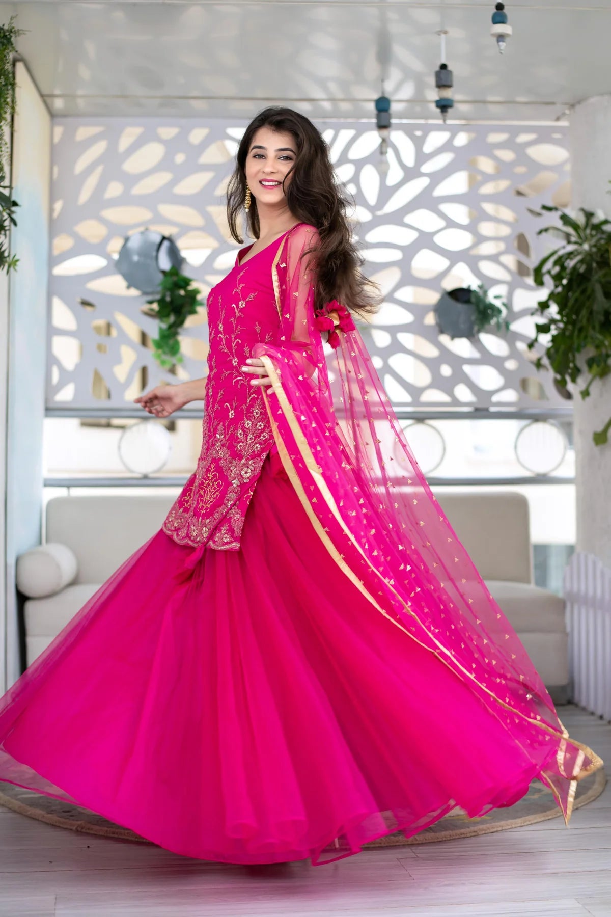 Women Pink Georgette Heavy Work Kurta with Flowing Skirt and Net Dupatta